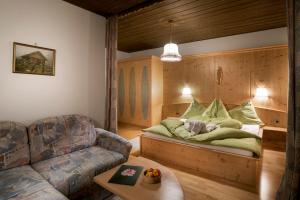 Ένα ή περισσότερα κρεβάτια σε δωμάτιο στο Straganzhof