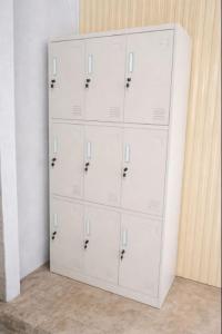 a white closet with lockers in a room at 1000 Stars Riverside Hostel in Ban Khrae Yao Doi Bo