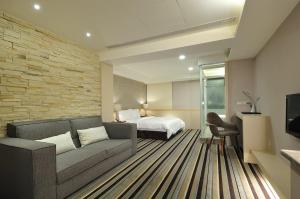 TV a/nebo společenská místnost v ubytování Sun Sweet Hotel