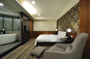 Postel nebo postele na pokoji v ubytování Sun Sweet Hotel