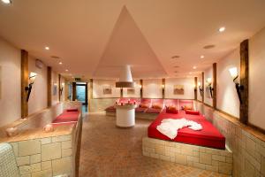 Rúm í herbergi á Hotel Königgut