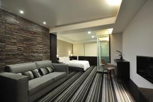 Postel nebo postele na pokoji v ubytování Sun Sweet Hotel
