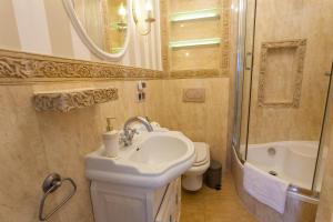 Kúpeľňa v ubytovaní Apartamenty Parkowa