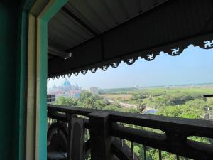 a view of the city from a balcony at Narasimha Dev Guest House in mayapur +68 photos