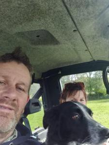 a man and a woman in a car with a dog at Beechwood Farmhouse in Yelverton +12 photos