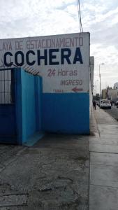 a sign on the side of a building at Hotel Plaza Bolognesi 344 in Trujillo