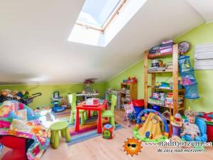 a room filled with lots of different types of toys at Pokoje Gosia in Puck