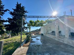 a walkway leading up to a white building at White Hill in Ulcinj