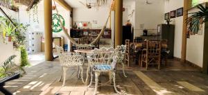 a room with a table and chairs in a restaurant at Casa Mazunte Tierra Viva in Mazunte +36 photos