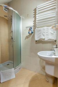 Kúpeľňa v ubytovaní Apartamenty Parkowa