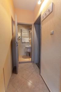 Kúpeľňa v ubytovaní Apartamenty Parkowa