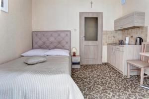 Posteľ alebo postele v izbe v ubytovaní Apartamenty Parkowa