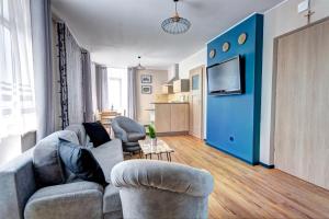 Kuchyňa alebo kuchynka v ubytovaní Apartamenty Parkowa