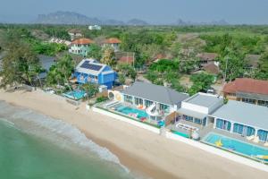 an aerial view of a house on the beach at SunRise Beachfront Cha am in Ban Bang Ket