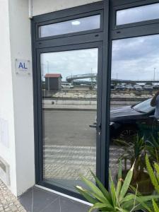 a window with a view of a parking lot at Salina Ria Studio 2 in Aveiro