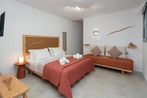 a hotel room with two beds and a table at Vilianna in Zefiría +61 photos