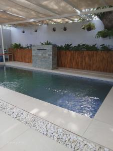 a swimming pool in a building with a swimming pool at Evergreen Private Pool Villa - Cavite in General Trias