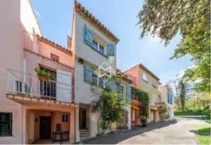a row of houses with balconies on a street at Maison Azur -Luxury Townhouse Garden -Parking -Croix des Gardes in Cannes