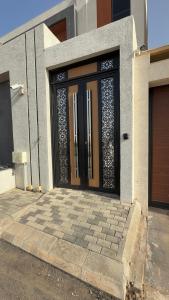 a front door of a house with a door at دار طيبة in Medina