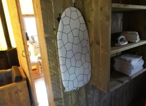 a mirror is hanging in a wooden cabinet at F1 Group Stay Close to Track Parking Grumpy in Amblève