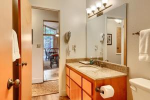 a bathroom with a sink and a mirror at 10B Arrow Lodge in North Wawona +29 photos