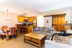 a living room with a couch and a table at 09 Valhalla in Whistler