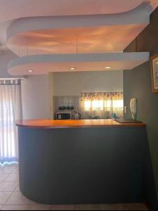 a kitchen with a counter top in a room at SPiNETTO PREMiUM in Santa Rosa