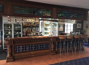 Lounge nebo bar v ubytování Coachman's Eden