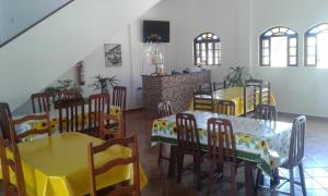 Restoran või mõni muu söögikoht majutusasutuses Pousada Gira-Sol