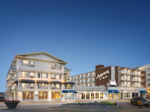 a rendering of a hotel and a building at Ashworth by the Sea in Hampton