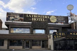 a building with a sign that reads la frontier hotel at Hotel La Frontera in Ciudad Juárez