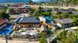 an aerial view of a house with a pool at Bản Lướt Homestay -Ngọc Chiến Hotspring in Sơn La +63 photos