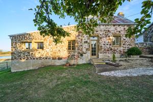 an image of a stone house at Shepherd's Cottage at Lisdillon Estate in Little Swanport +58 photos