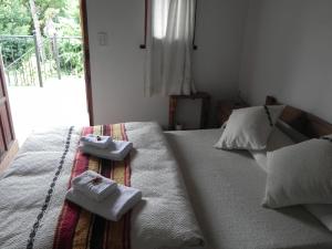 Postel nebo postele na pokoji v ubytování La Posta Tigre