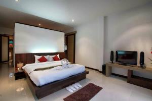 Кровать или кровати в номере Seastone Private Pool Villas