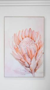 a painting of a pink flower on a white background at 'Seaside Azul' A Central Studio with Rooftop Pool in Cairns