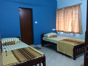 Postel nebo postele na pokoji v ubytování Cherish homestay