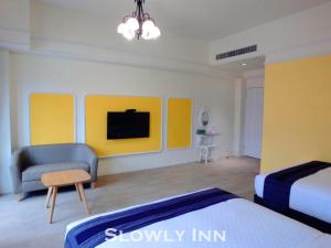 Katil atau katil-katil dalam bilik di Slowly inn