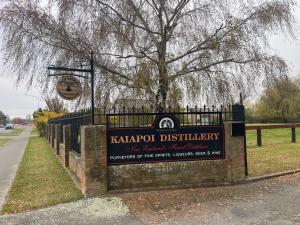 a sign for the kazaporoth districtlibrary on a fence at Kaiapoi Village Le Shack in Kaiapoi