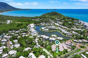 an aerial view of a resort with a harbor at Lagoon Lookout - Poolside Studio near Trinity Beach in Trinity Beach
