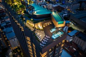 an overhead view of a building with a swimming pool at The Edge central pattaya in Pattaya
