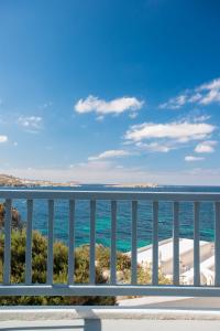 a view of the ocean from a balcony at Hotel Adonis in Mikonos
