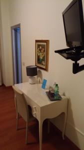 TV a/nebo společenská místnost v ubytování Hotel L'Approdo