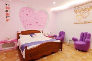 Letto o letti in una camera di Zi Jìng Fang Inn