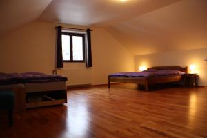 
Posteľ alebo postele v izbe v ubytovaní Villa Lavender
