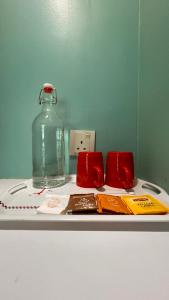 a table with a glass jar on top at Bright Hotel in Petaling Jaya