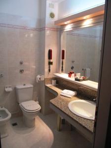 Koupelna v ubytování Hotel Grazia Deledda
