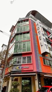 a building with a sign on the side of it at Bright Hotel in Petaling Jaya