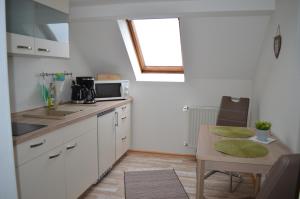 Dapur atau dapur kecil di Ferienwohnung Gänseblümchen