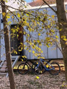 two bikes parked in front of a house at The Grit - Adults-Only Modern Design House near Brașov in Vama Buzăului